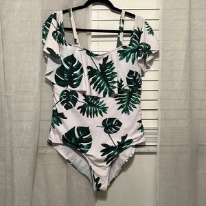 Palm leaves plus swim suit